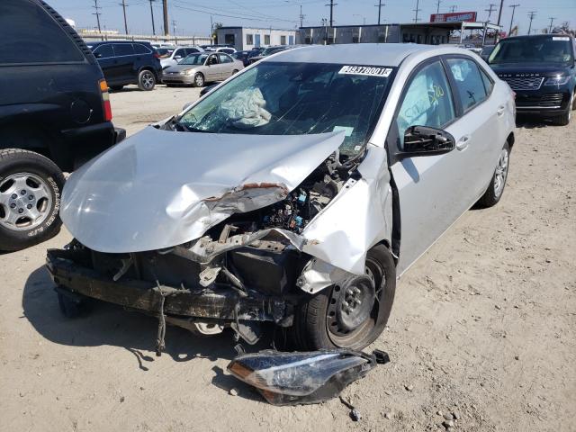 Photo 1 VIN: 5YFBURHE6KP889204 - TOYOTA COROLLA L 