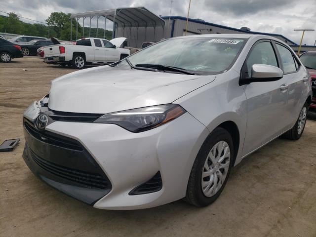 Photo 1 VIN: 5YFBURHE6KP889879 - TOYOTA COROLLA L 