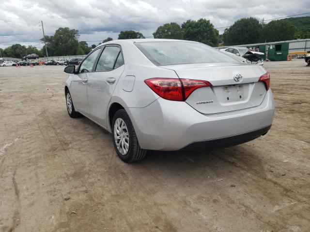 Photo 2 VIN: 5YFBURHE6KP889879 - TOYOTA COROLLA L 