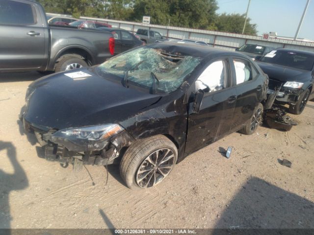 Photo 1 VIN: 5YFBURHE6KP890322 - TOYOTA COROLLA 