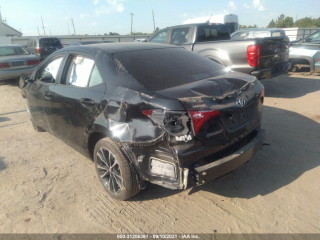 Photo 2 VIN: 5YFBURHE6KP890322 - TOYOTA COROLLA 