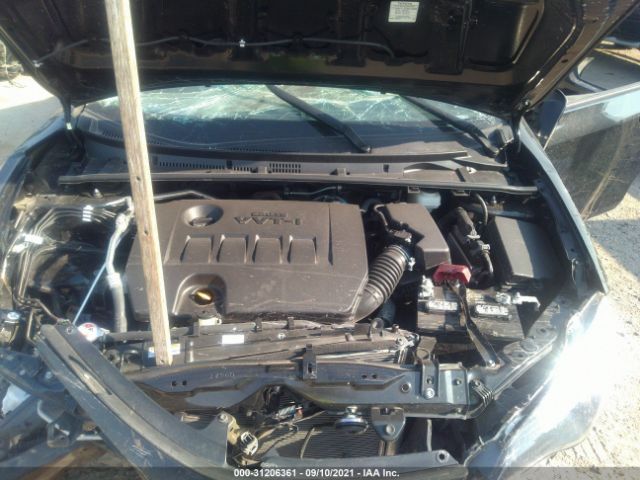 Photo 9 VIN: 5YFBURHE6KP890322 - TOYOTA COROLLA 