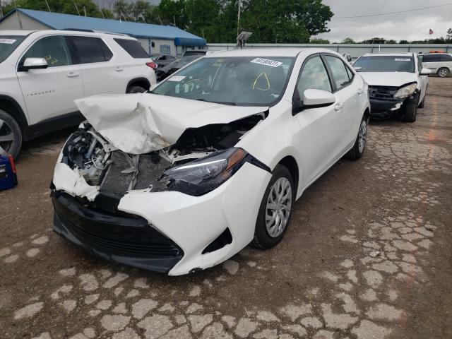 Photo 1 VIN: 5YFBURHE6KP890739 - TOYOTA COROLLA L 