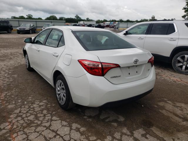 Photo 2 VIN: 5YFBURHE6KP890739 - TOYOTA COROLLA L 