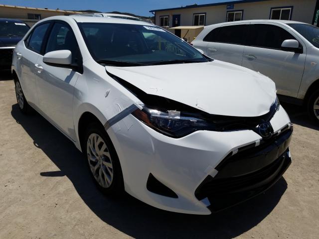 Photo 0 VIN: 5YFBURHE6KP893026 - TOYOTA COROLLA L 