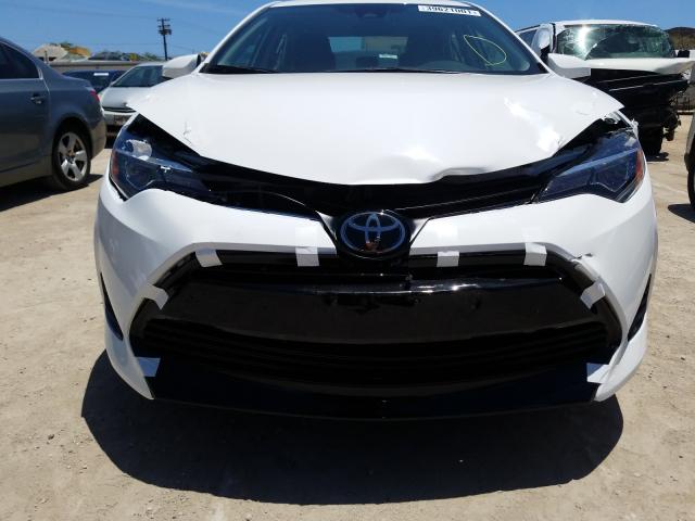 Photo 8 VIN: 5YFBURHE6KP893026 - TOYOTA COROLLA L 