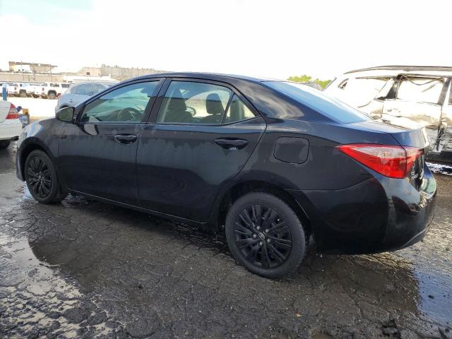 Photo 1 VIN: 5YFBURHE6KP895973 - TOYOTA COROLLA L 