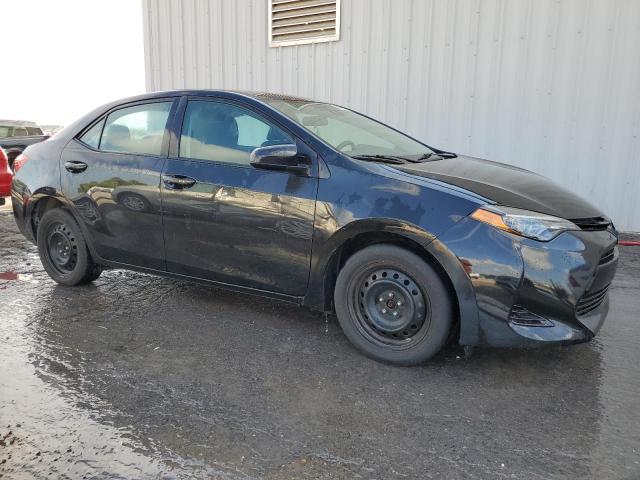 Photo 3 VIN: 5YFBURHE6KP895973 - TOYOTA COROLLA L 