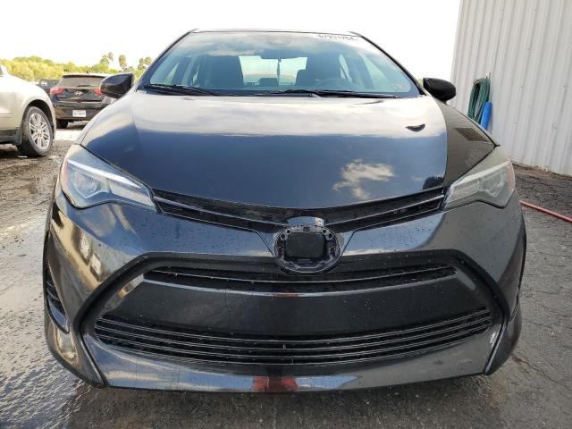 Photo 4 VIN: 5YFBURHE6KP895973 - TOYOTA COROLLA L 