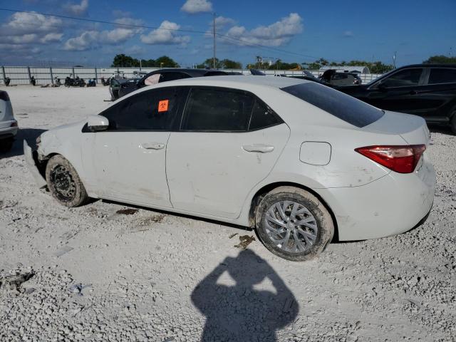 Photo 1 VIN: 5YFBURHE6KP896637 - TOYOTA COROLLA L 