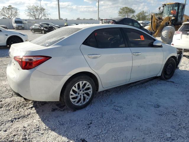 Photo 2 VIN: 5YFBURHE6KP896637 - TOYOTA COROLLA L 