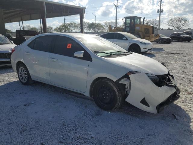 Photo 3 VIN: 5YFBURHE6KP896637 - TOYOTA COROLLA L 