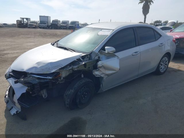 Photo 1 VIN: 5YFBURHE6KP897402 - TOYOTA COROLLA 