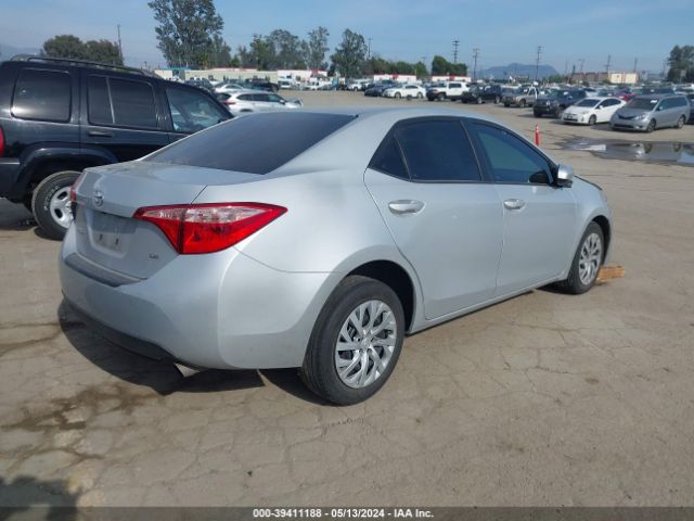 Photo 3 VIN: 5YFBURHE6KP897402 - TOYOTA COROLLA 