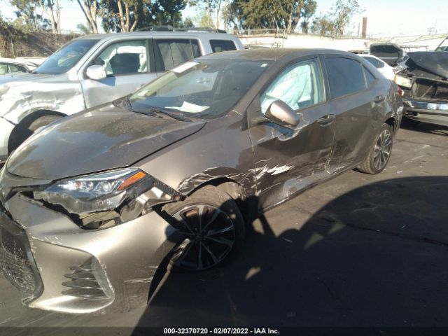 Photo 1 VIN: 5YFBURHE6KP898873 - TOYOTA COROLLA 