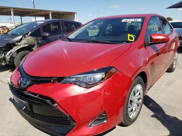 Photo 1 VIN: 5YFBURHE6KP899036 - TOYOTA COROLLA L 