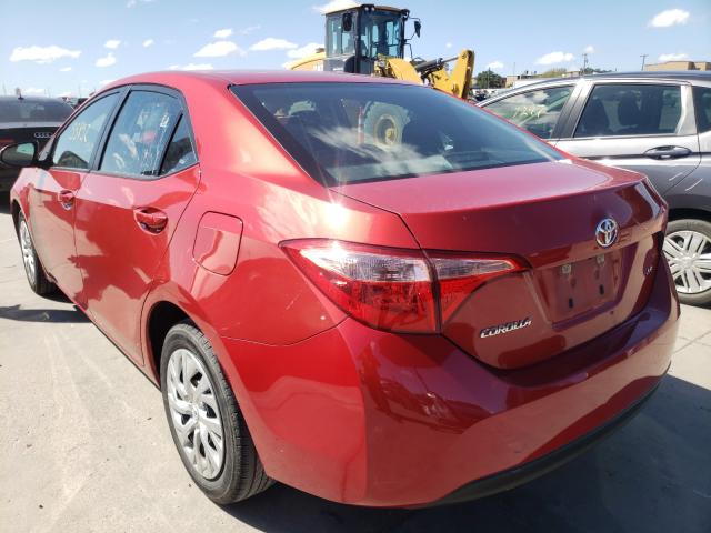 Photo 2 VIN: 5YFBURHE6KP899036 - TOYOTA COROLLA L 