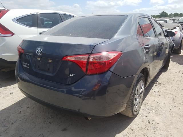 Photo 3 VIN: 5YFBURHE6KP902937 - TOYOTA COROLLA L 