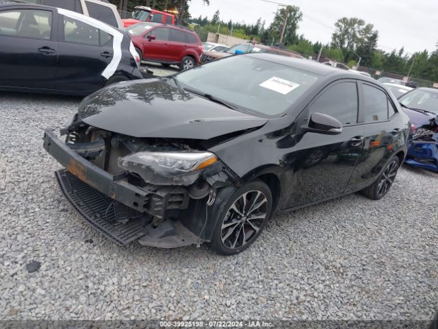 Photo 1 VIN: 5YFBURHE6KP905501 - TOYOTA COROLLA 