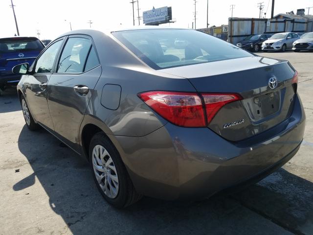 Photo 2 VIN: 5YFBURHE6KP910424 - TOYOTA COROLLA L 