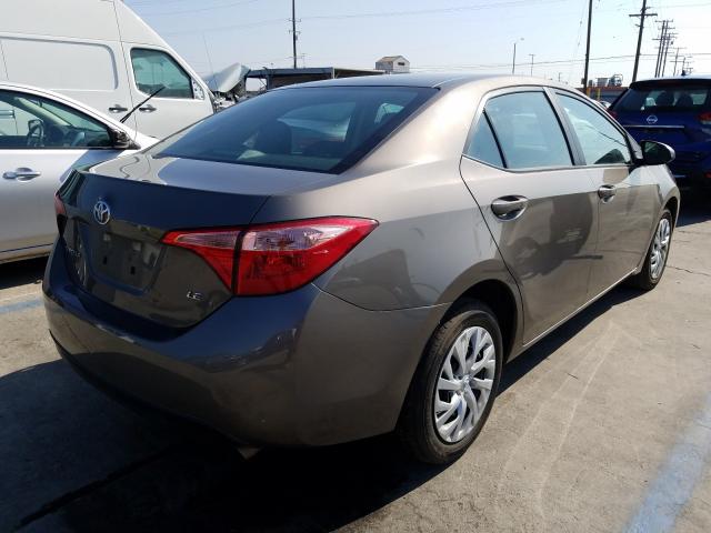 Photo 3 VIN: 5YFBURHE6KP910424 - TOYOTA COROLLA L 