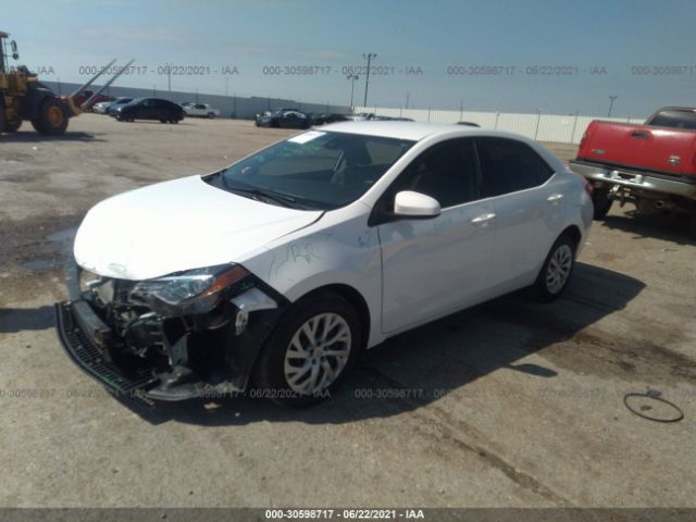 Photo 1 VIN: 5YFBURHE6KP915381 - TOYOTA COROLLA 