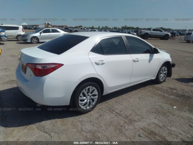 Photo 3 VIN: 5YFBURHE6KP915381 - TOYOTA COROLLA 