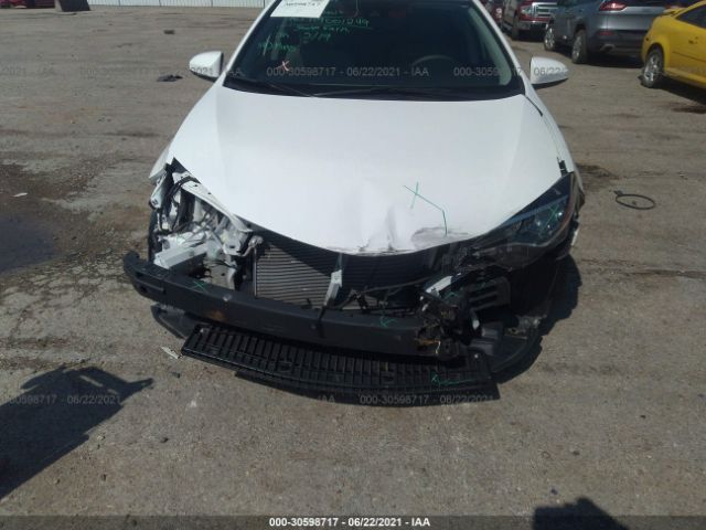 Photo 5 VIN: 5YFBURHE6KP915381 - TOYOTA COROLLA 