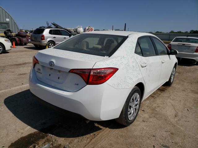 Photo 3 VIN: 5YFBURHE6KP917700 - TOYOTA COROLLA L 