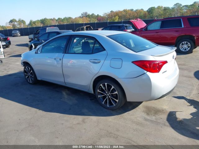 Photo 2 VIN: 5YFBURHE6KP920175 - TOYOTA COROLLA 