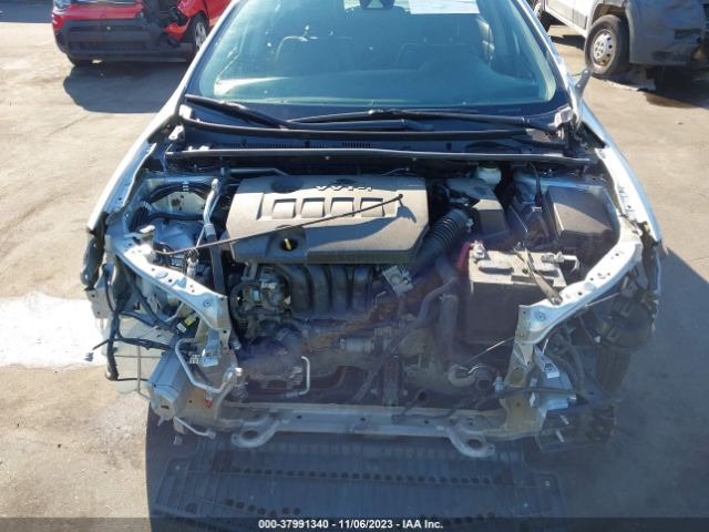 Photo 9 VIN: 5YFBURHE6KP920175 - TOYOTA COROLLA 