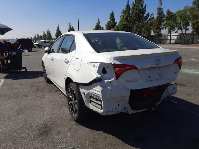 Photo 2 VIN: 5YFBURHE6KP920645 - TOYOTA COROLLA L 