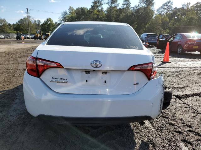 Photo 5 VIN: 5YFBURHE6KP922217 - TOYOTA COROLLA L 