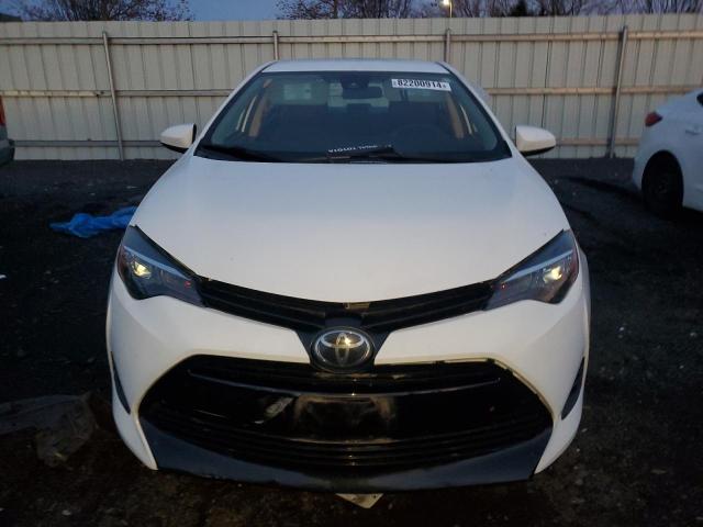 Photo 4 VIN: 5YFBURHE6KP922573 - TOYOTA COROLLA L 