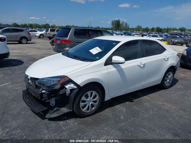 Photo 1 VIN: 5YFBURHE6KP932620 - TOYOTA COROLLA 