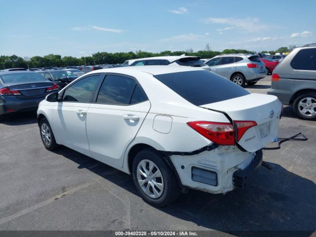 Photo 2 VIN: 5YFBURHE6KP932620 - TOYOTA COROLLA 