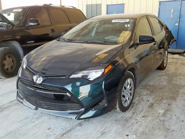 Photo 1 VIN: 5YFBURHE6KP942273 - TOYOTA COROLLA L 