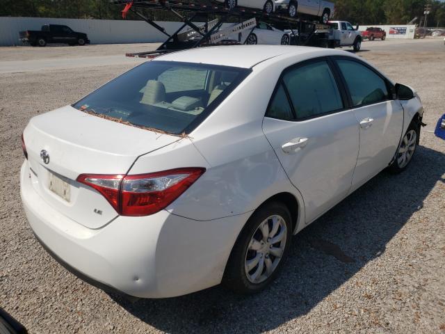 Photo 3 VIN: 5YFBURHE7EP102877 - TOYOTA COROLLA L 