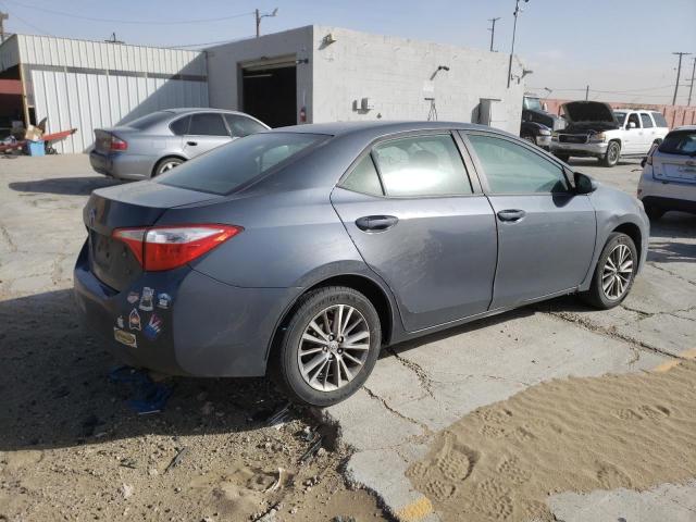 Photo 2 VIN: 5YFBURHE7EP104385 - TOYOTA COROLLA L 