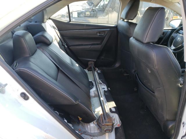 Photo 5 VIN: 5YFBURHE7EP110834 - TOYOTA COROLLA L 