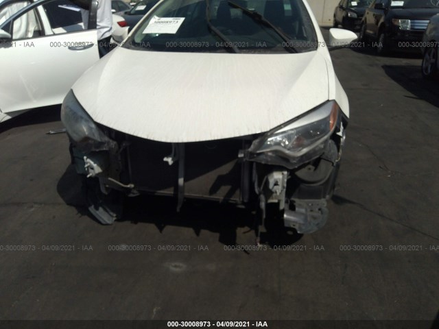 Photo 7 VIN: 5YFBURHE7EP113524 - TOYOTA COROLLA 