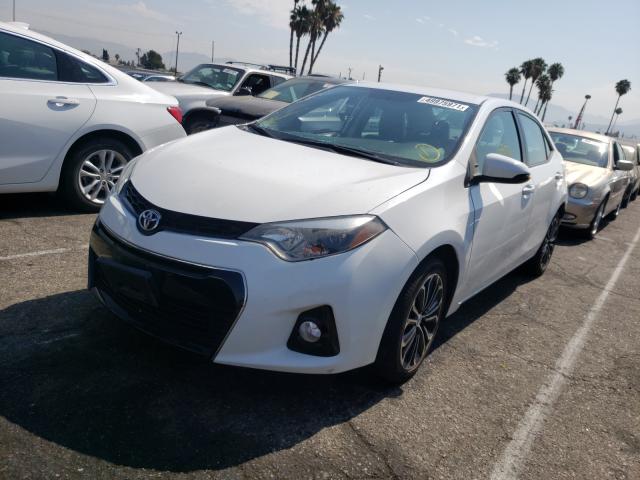 Photo 1 VIN: 5YFBURHE7EP138570 - TOYOTA COROLLA L 