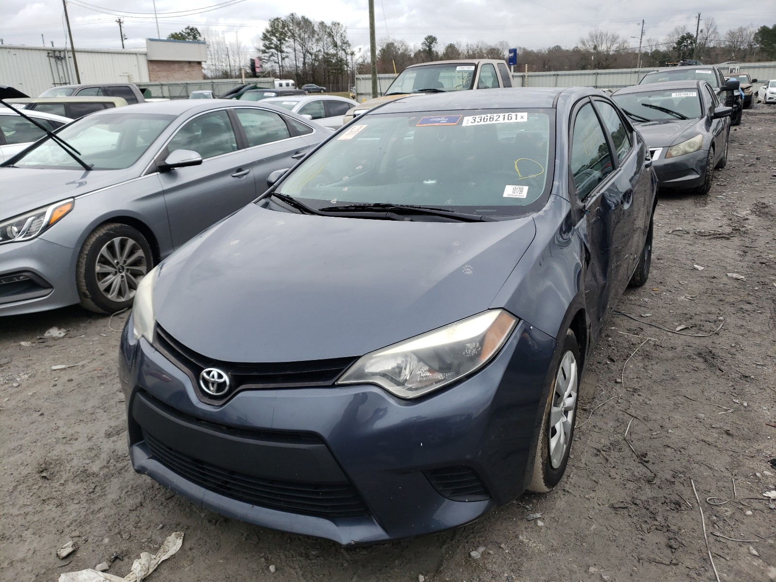 Photo 1 VIN: 5YFBURHE7EP165915 - TOYOTA COROLLA L 