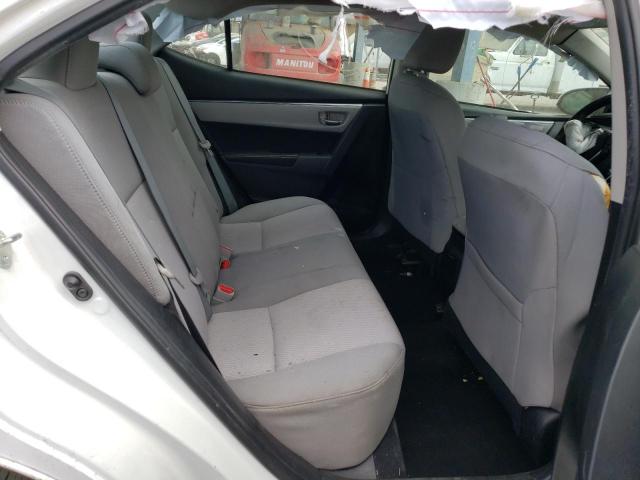 Photo 9 VIN: 5YFBURHE7EP169382 - TOYOTA COROLLA L 