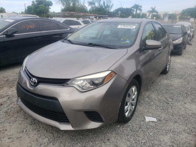 Photo 1 VIN: 5YFBURHE7EP176929 - TOYOTA COROLLA L 