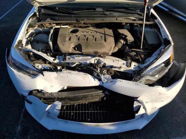 Photo 10 VIN: 5YFBURHE7FP232899 - TOYOTA COROLLA L 