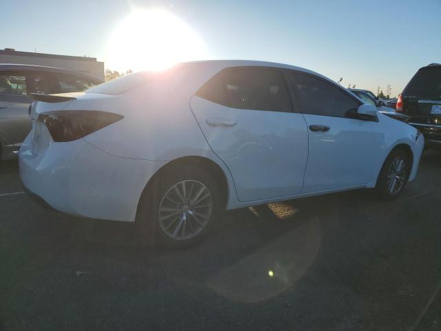 Photo 2 VIN: 5YFBURHE7FP232899 - TOYOTA COROLLA L 