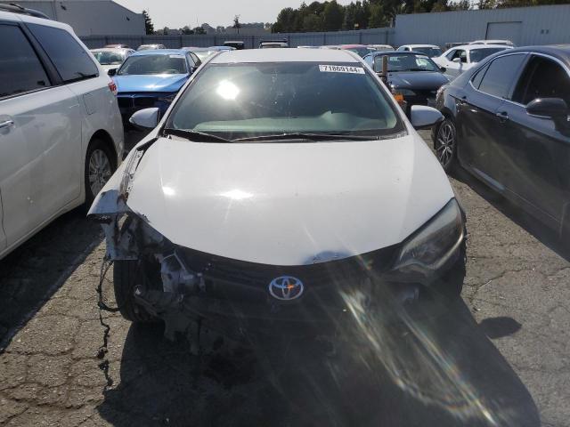 Photo 4 VIN: 5YFBURHE7FP258239 - TOYOTA COROLLA L 