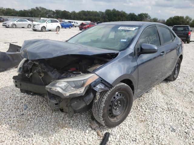 Photo 1 VIN: 5YFBURHE7GP390872 - TOYOTA COROLLA L 