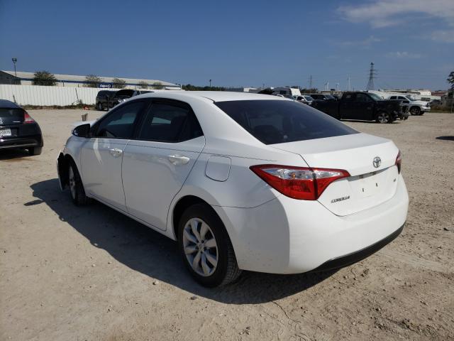 Photo 2 VIN: 5YFBURHE7GP450634 - TOYOTA COROLLA L 